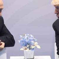 U.S. President Donald Trump and Russian President Vladimir Putin hold a meeting on the sidelines of the G20 Summit in Hamburg, Germany, on July 7, 2017. A long-awaited summit between the U.S. president and his Russian counterpart will take place in Helsinki on July 16, the Kremlin said in a statement Thursday. Trump to meet Putin in Helsinki on July 16 for first bilateral summit between U.S. and Russia leaders