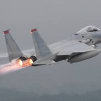 A U.S. Air Force’s F-15 aircraft takes off at Kadena U.S. Air Force Base on Okinawa Island in 2009. U.S. F-15 from Kadena crashes off Okinawa; pilot rescued by ASDF