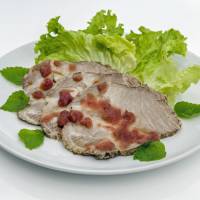 Fruity: Ume nibuta (umeboshi-simmered pork) with lettuce, mint leaves and an umeboshi sauce. A recipe for the rainy season: <I>Umeboshi</I>-simmered pork