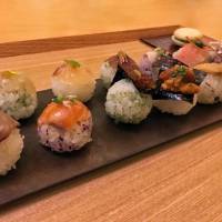 Elegant creations: Each temari-zushi comes with its own topping, from ika (squid) and sweet chili, to cured duck and yuzu citrus. Temarizushi Souden