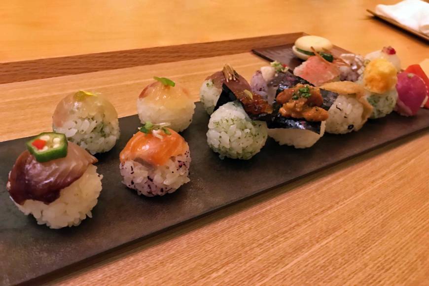 Temarizushi Souden Elegant creations: Each temari-zushi comes with its own topping, from ika (squid) and sweet chili, to cured duck and yuzu citrus. | J.J. O'DONOGHUE