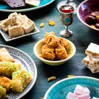 An Eid al-Fitr feast to mark the end of Ramadan. Sweeter dishes are staples of the first breakfast during the holiday that can last up to three days. | GETTY IMAGES