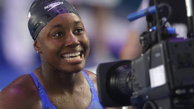 U.S. star Simone Manuel, seen smiling after winning the gold medal in the women’s 100-meter freestyle final at the world championships in July 2017 in Budapest, has won the Honda Cup as the collegiate woman athlete of the year. Olympic champion and Stanford swimmer Simone Manuel wins Honda Cup