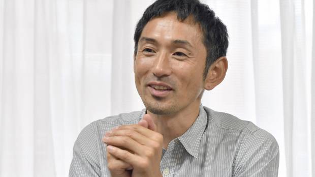 Former Olympic hurdler Dai Tamesue speaks during a May 31 interview with The Japan Times in Tokyo. Three-time Olympian Dai Tamesue provides detailed critique of sports in Japan