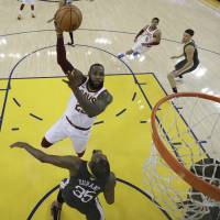 Cavaliers superstar LeBron James, shooting over the Warriors’ Kevin Durant in Game 2 of the NBA Finals on Sunday, has led his teams to eight consecutive appearances in the championship round. LeBron's postseason run has been incredible, but Jordan still the man