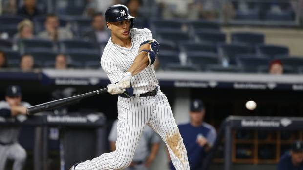 Yankees outfielder Giancarlo Stanton connects on a walk-off two-run home run during the ninth inning of New York’s 7-5 win over the Mariners. Giancarlo Stanton caps Yankees comeback with walk-off blast against Mariners