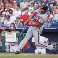 Washington’s Juan Soto blasts a home run in the first inning against Philadelphia on Friday night. Sluggers ignite Nationals in rout