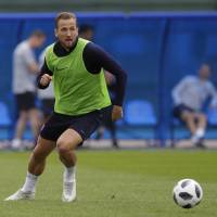England’s Harry Kane looks to pass the ball during a training session at Spartak Zelenogorsk Stadium near St. Petersburg, Russia, on Wednesday. England hoping to end major tournament jinx