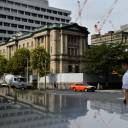 A man walks outside the Bank of Japan in Tokyo.