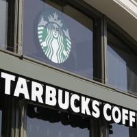 A Starbucks store on the Embarcadero in San Francisco is seen in 2012. Starbucks and other employers in California must pay workers for minutes they routinely spend off the clock on tasks such as locking up or setting the store alarm, the state Supreme Court ruled Thursday. The unanimous ruling was a big victory for hourly workers in California and could prompt additional lawsuits against employers in the state. Starbucks, other California employers ordered to pay workers for off-clock tasks