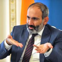 Armenian Prime Minister Nikol Pashinyan speaks during an interview on June 9 in Yerevan. New Armenia leader Pashinyan targets former elite in graft crackdown