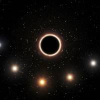 This artist’s impression provided by the European Southern Observatory in Julyshows the path of the star S2 as it passes close to the supermassive black hole at the center of the Milky Way galaxy. As the star gets nearer to the black hole, a very strong gravitational field causes the color of the star to shift slightly to the red, an effect of Einstein’s general theory of relativity. European researchers reported the results of their observations in the journal Astronomy & Astrophysics on Thursday. Scientists track star to confirm Albert Einstein's supermassive black hole theory