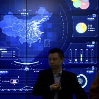 An electronic data display shows a map of China at the Global Mobile Internet conference in Beijing on April 26. Chinese hackers infiltrated Cambodia sites ahead of polls, U.S. security-research firm says