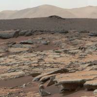 A mosaic of images from NASA’s Curiosity rover shows sedimentary deposits in the Glenelg area of Gale Crater on Mars on Dec. 9, 2013. Drill tests and a chemical analysis of fine-grained rocks by the robot’s science instruments suggest microbial life could have thrived there billions of years ago. Space experts worry U.S. won't make it to Mars by 2030s