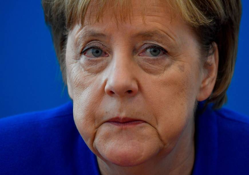 Chaos in Merkel's coalition after minister dangles resignation The