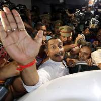 Kuldeep Singh Sengar, a legislator of Uttar Pradesh state from India’s ruling Bharatiya Janata Party (BJP), reacts as he leaves a court after he was arrested in April in connection with the rape of a teenager, in Lucknow, India. Indian lawmaker in Modi's party charged in connection with rape of teenage girl