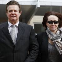 Paul Manafort, President Donald Trump’s former campaign chairman, walks with this wife, Kathleen Manafort, as they arrive at the Alexandria Federal Courthouse in Alexandria, Virgina, in March. Special counsel Robert Mueller is seeking immunity for five potential witnesses in the upcoming trial of Manafort. Mueller’s office told a federal judge in Virginia on Tuesday that they were seeking to compel the witnesses to testify under condition of immunity. Robert Mueller asks judge to grant immunity to five witnesses ahead of Paul Manafort trial