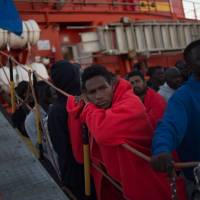 Migrants rescued at sea wait to be transferred at the harbor of Algeciras on Saturday. The Spanish interior minister urged to find a “European solution” to the “problem of immigration” after the Spanish coast guard helped more than 1,200 migrants at sea in two days. Spain rescues over 200 migrants from 21 boats off Gibraltar