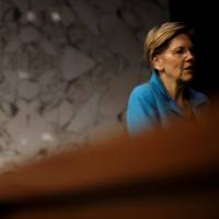 U.S. Sen. Elizabeth Warren (D-MA) waits for a Banking Committee hearing to begin on Capitol Hill as fallout continued over U.S. President Donald Trump’s Helsinki summit with Russian President Vladimir Putin, in Washington Tuesday. EU woos Asia as U.S. ties slide further after Trump's divisive tour, kowtow to Putin