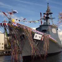 The Maritime Self-Defense Force’s new Maya-class destroyer is seen during a launching ceremony in Yokohama on Monday. Japan launches next-generation destroyer carrying latest version of the Aegis anti-missile system