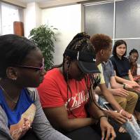 One step beyond: Eric Jordan (right) and students from New York’s Frederick Douglass Academy VII High School take part in a discussion at Ginza Hub in Tokyo. The trip around Japan was partly financed by a crowdfunding campaign. With Japan trip, New York teacher proves to inner-city students that sky's the limit