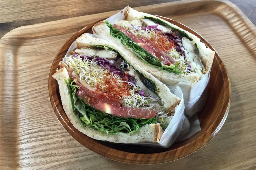 Dai’s Deli Well stuffed: The saba (mackerel) sandwich comes packed with fresh vegetables. | J.J. O'DONOGHUE