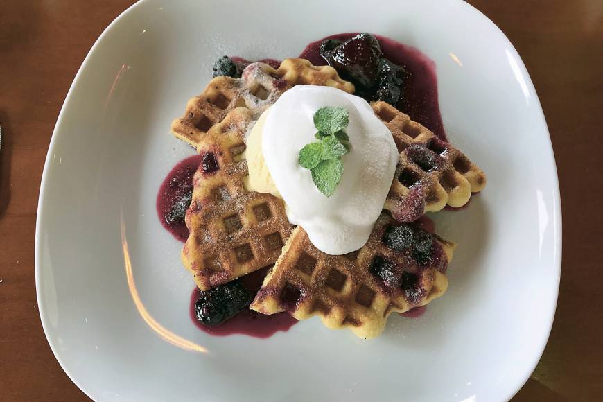 Otto Knot House special: Otto Knot's waffles, covered in raspberry sauce and ice cream. | J.J. O'DONOGHUE