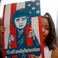 Pots and kettles: A girl takes part in a protest in Chicago last month against U.S. immigration policies that led to the separation of thousands of migrant parents from their children. The situation in the U.S. now shouldn’t distract activists from what is happening in immigration detention centers in Japan, for example. What about we stop it with the 'whataboutism'?
