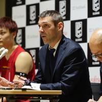 Former Toyama Grouses head coach Miodrag Rajkovic (center), seen during a news conference in May, has been hired to lead the Nishinomiya Storks. Storks hand coaching reins to Miodrag Rajkovic