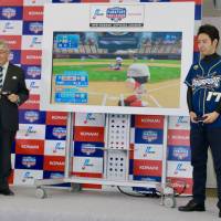NPB commissioner Atsushi Saito tosses a ceremonial first pitch against 2017 ebaseball championship titlist Maepi in a video game at a Tokyo news conference on Thursday. NPB getting on board with boom in esports