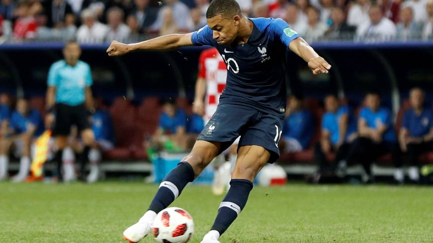 France’s Kylian Mbappe scores a goal in the World Cup final on July 15. World Cup star Kylian Mbappe played through back injury in final two games