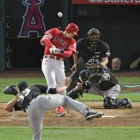Los Angeles designated hitter Shohei Ohtani rockets a two-run homer in the fifth inning against Chicago on Wednesday night. Shohei Ohtani, Angels feast on White Sox pitching