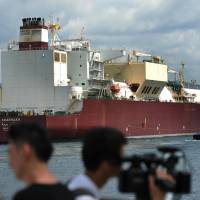 A vessel carrying liquefied natural gas (LNG) from Qatar approaches the new LNG terminal of China National Offshore Oil Corp (CNOOC) in Shenzhen, Guangdong province, China, Aug. 1. Breathing easy in Beijing may get pricier as Xi targets U.S. LNG amid trade row