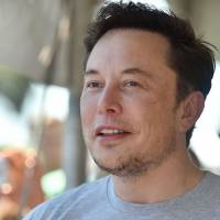 Elon Musk Elon Musk admits exhaustion as tweet storm deepens