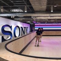 People try the roller skating rink at Ginza Sony Park in Tokyo during a media preview of the facility on Wednesday. Sony opens experimental 'park' in Ginza