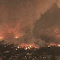 A fire tornado over the Lake Keswick Estates near Redding, California, on July 26 Record-breaking fire tornado kills California firefighter