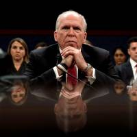 Former CIA director John Brennan testifies before the House Intelligence Committee in Washington in May 2017. Trump turns fire on ex-CIA chief in proxy fight over Mueller's Russia probe