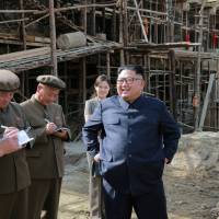 In this undated photo released Sunday, North Korean leader Kim Jong Un is seen giving on-the-spot guidance during a visit to a construction site in Samjiyon county. North Korea alludes to confrontation with U.S. over secret nuclear sites during negotiations