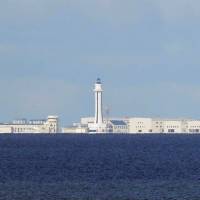 Chinese structures are pictured on one of the disputed Spratly islands in the South China Sea on April 21. U.S. military has strong words for Beijing after warnings during flight over South China Sea