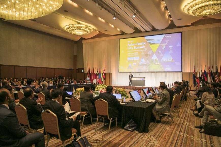 Summit participants attend the opening ceremony on Aug. 1.