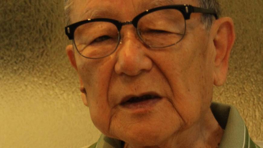 Hisao Mesaki speaks in Nagoya during a recent interview about his experiences before and during World War II. Aichi man recalls abuse his family faced when branded spies before World War II