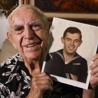 Daryl Weathers poses for a picture at his home in Seal Beach, California, Tuesday. Weathers was aboard the USS Abner Read after it hit a sea mine left by the Japanese after they abandoned Kiska Island in Alaska’s Aleutian Islands in 1943. Survivor of newly found WWII shipwreck off Alaska: 'So many' to rescue