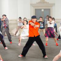Everybody dance now: Ryohei Kondo (center) invites aspiring dancers to take part in Yokohama Dance Paradise, a program that allows amateurs to dance alongside professionals to a routine inspired by the children’s song “Red Shoes.” In Yokohama, they'll be dancing in the streets