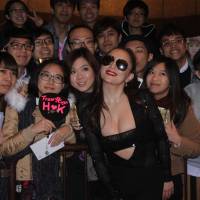 Up close and personal: Singer Ayumi Hamasaki (center) poses with fans on a street in Hong Kong in 2016. It'll take more than Ayumi Hamasaki to help streaming services in Japan