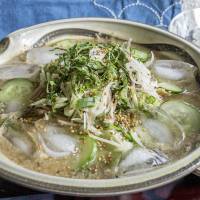 A bowl of hiyajiru soup, cooled with ice cubes. <I>Hiyajiru</I>: A soup to get over the last of the summer sweat