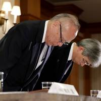 Tokyo Medical University officials apologize at a news conference in Tokyo on Tuesday. Much needs to be done before women can truly 'shine' in Japan