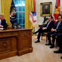 Mexican Foreign Minister Luis Videgaray (third from right), Economy Minister Ildefonso Guajardo (second from right), and Jesus Seade (right), President-elect Andres Obrador’s trade representative, meet with U.S. President Donald Trump in the Oval Office on Monday. Trump's Mexico trade deal reveals another deficit
