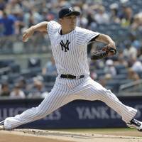 New York starter Masahiro Tanaka pitches against Tampa Bay in the first inning on Thursday. Masahiro Tanaka tagged with fourth loss as Rays beat Yankees