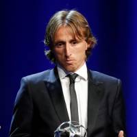 Real Madrid’s Luka Modric holds the UEFA Champions League Midfielder of the Season award on Thursday in Monte Carlo, Monaco. Luka Modric named UEFA player of year