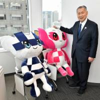 Yoshiro Mori, president of the Tokyo Organising Committee of the Olympic and Paralympic Games, is seen with Tokyo 2020 official mascots Miraitowa (left) and Someity, earlier this month at his office in Toranomon Hills. Mori touts transformative power of sports